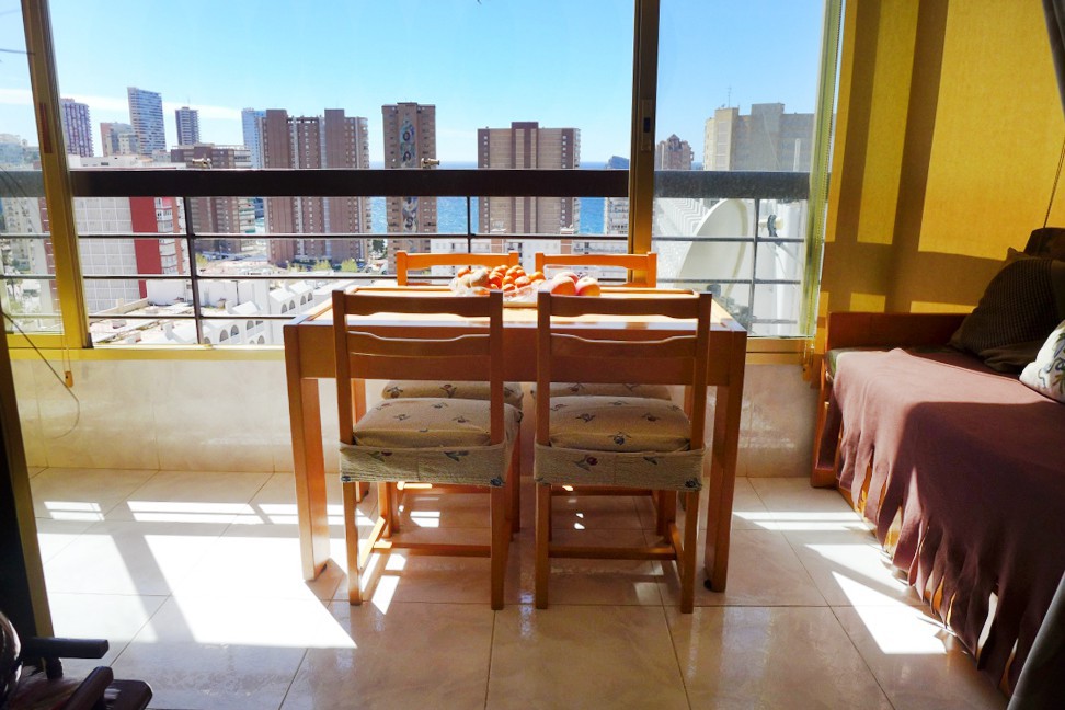 A terrace with a view of the sea.